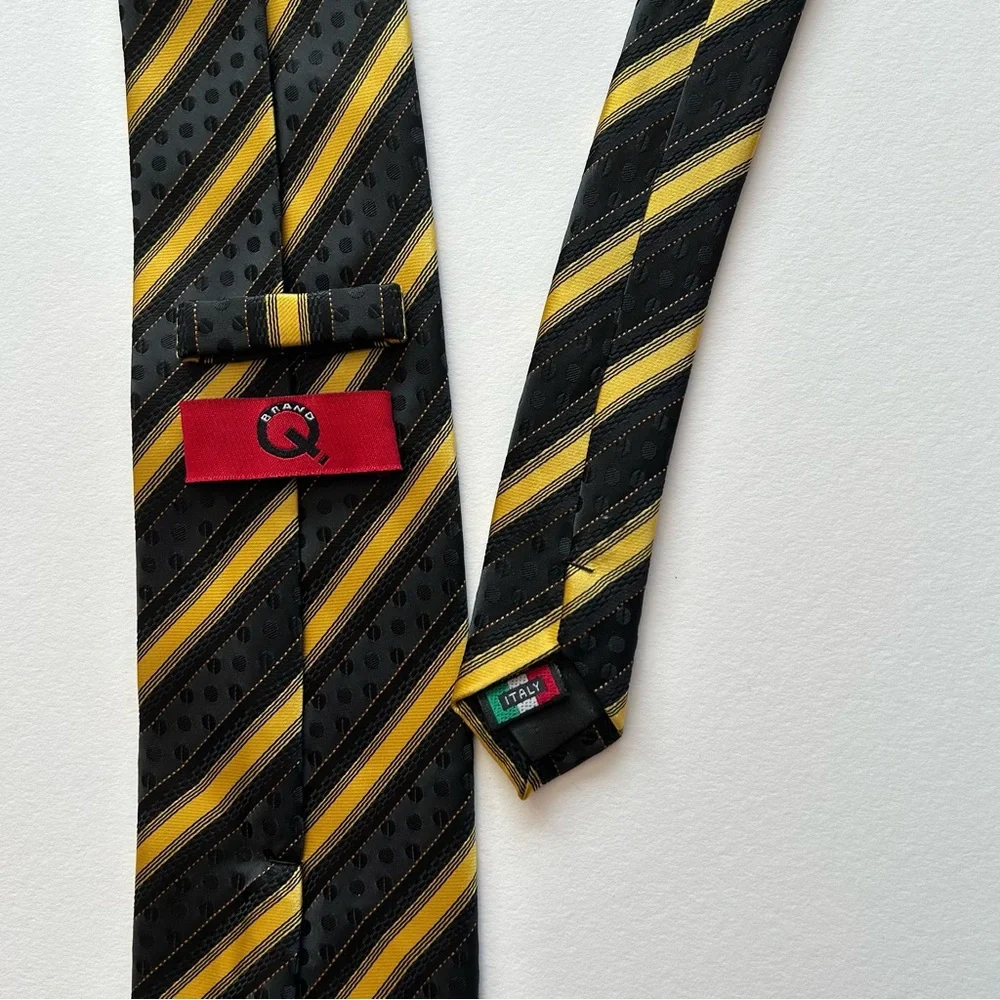 Striped black and gold men's dressy tie